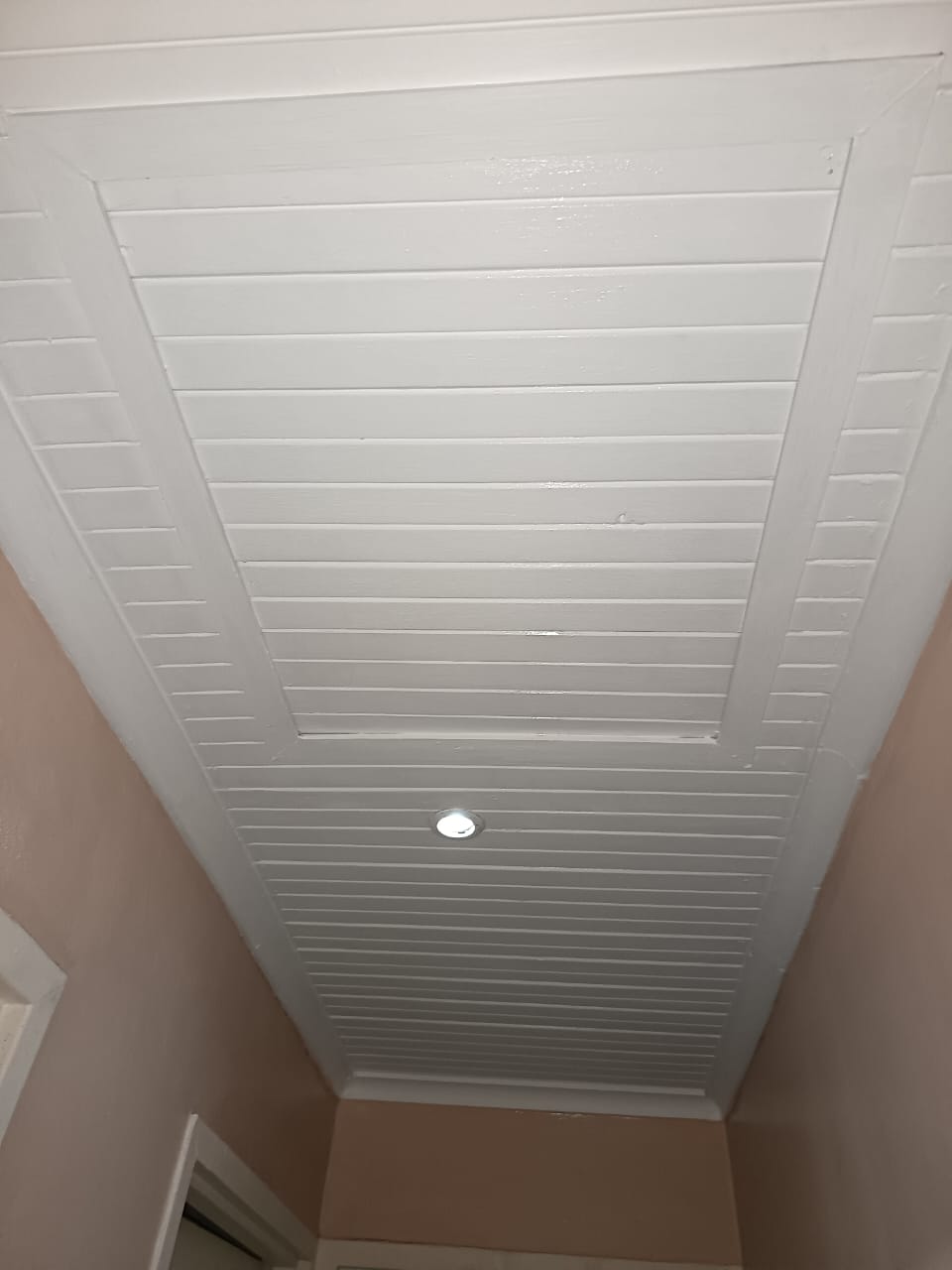 Completed finished PVC ceiling with recessed lighting