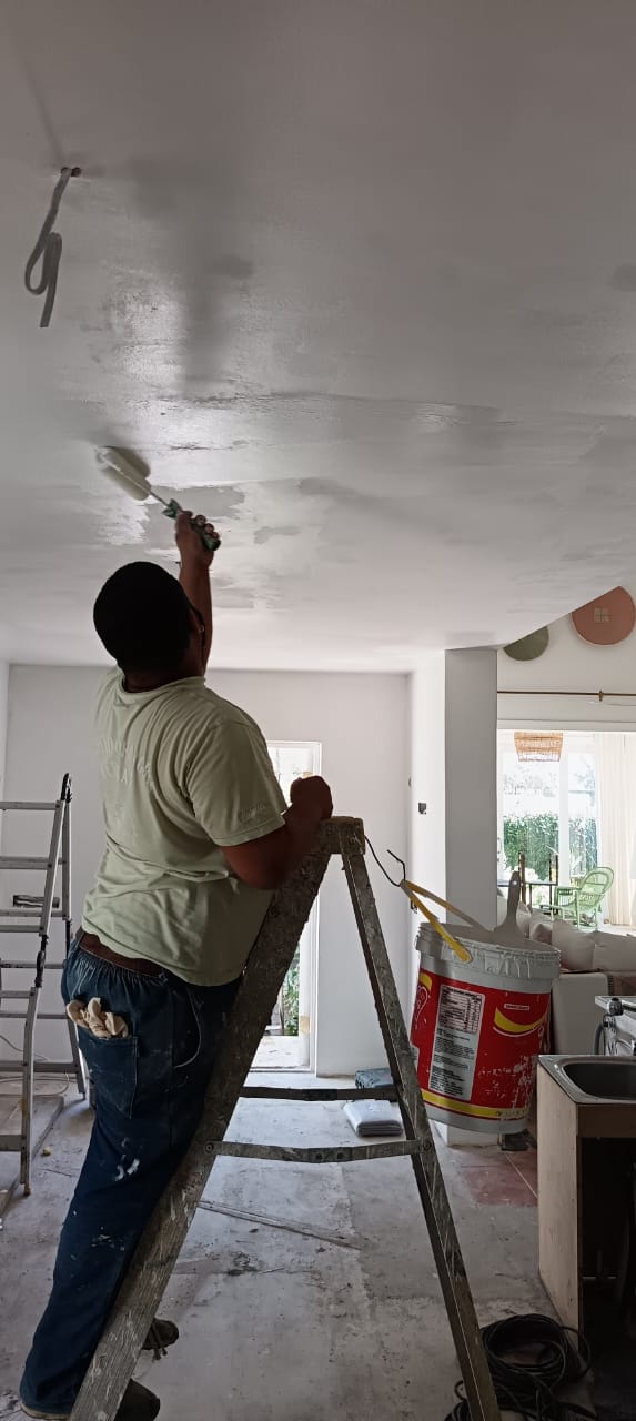 Residential ceiling skimming and repair in progress